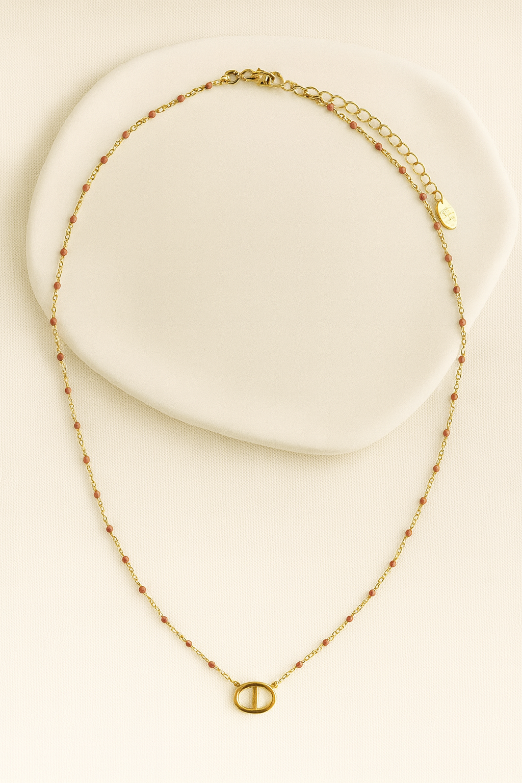 Collier perlé orange et doré