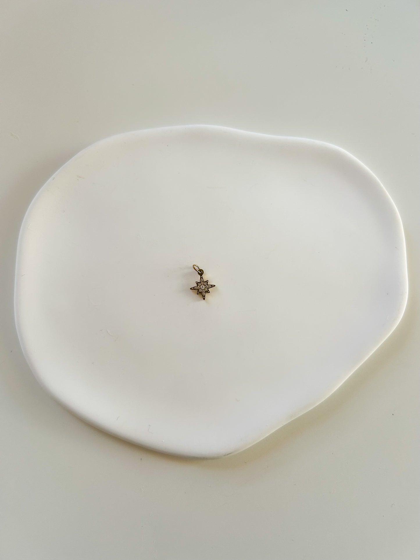 Charms pendentif petite étoile dorée avec strass