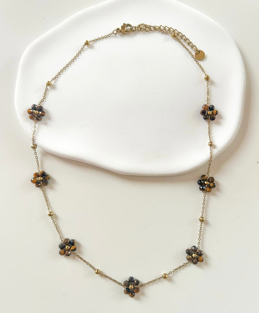 Collier doré avec 7 fleurs marrons
