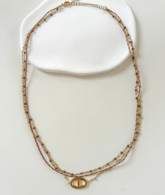 Collier multirangs doré avec perles et pendentif ovale