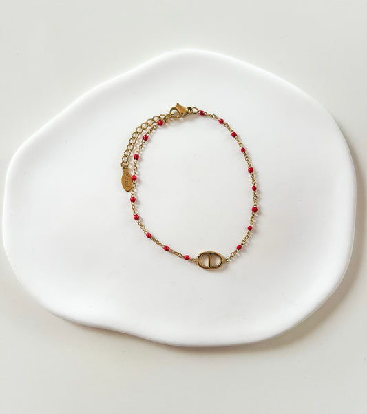 Bracelet minimaliste en perles dorées et rouges
